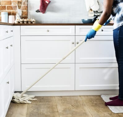 Mom doing house chores.